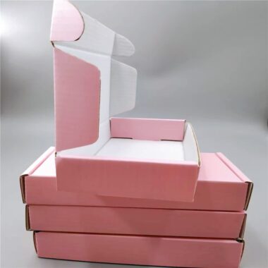 Custom pink corrugated paper folders for dresses